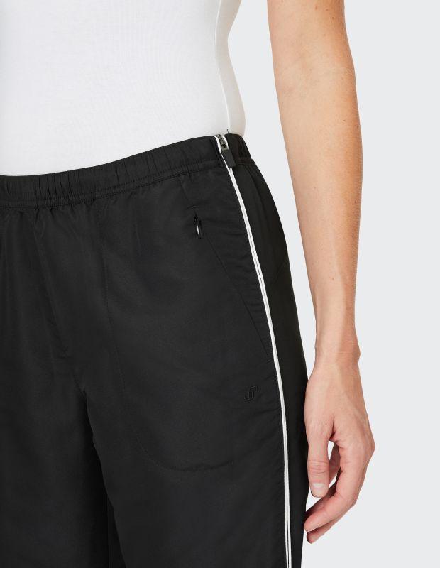 Joy Sportswear Sporthose MERRIT Zipper über das komplette Bein auf beiden Seiten Fabrik Onlineshop