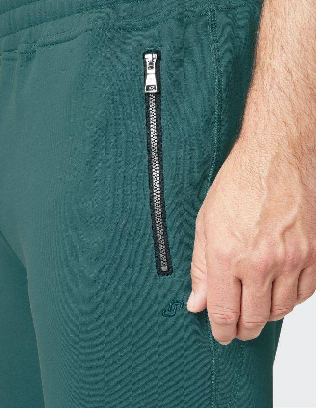 Joy Sportswear Freizeithose MAX Wärmende Hose mit modischem Zipper Fabrikpreis