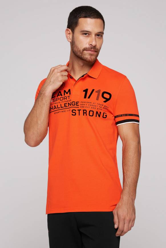 Soccx Pikee-Polo mit Flockprint signal orange Jubiläumsangebot