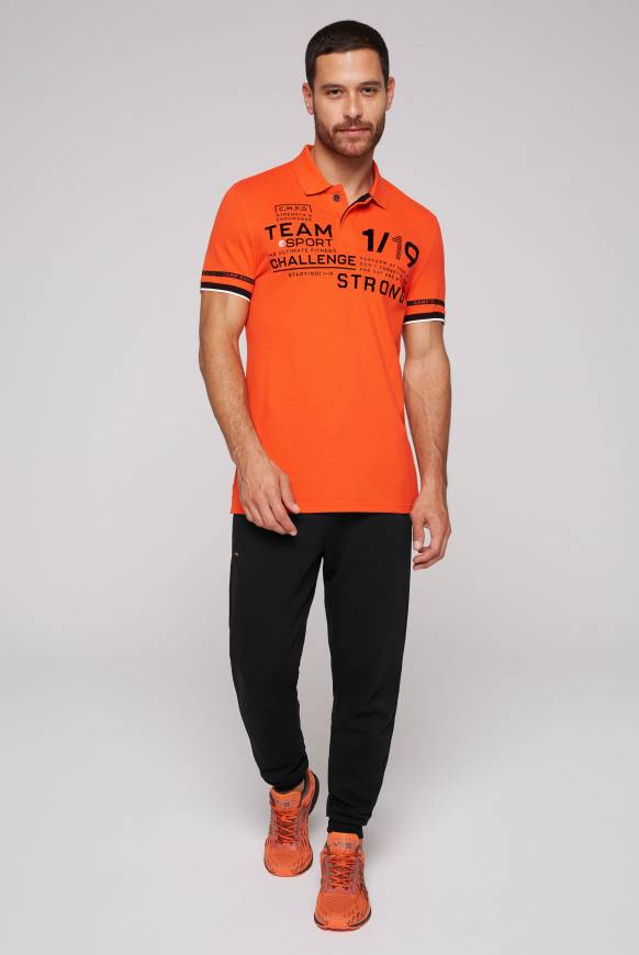 Soccx Pikee-Polo mit Flockprint signal orange Jubiläumsangebot