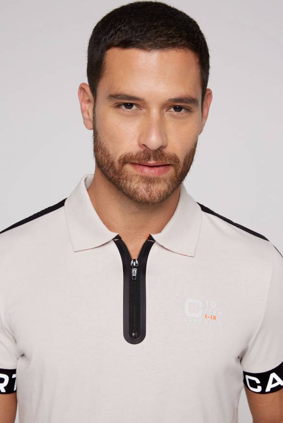 Soccx Poloshirt mit Zipper und reflektierenden Prints shell zollfrei