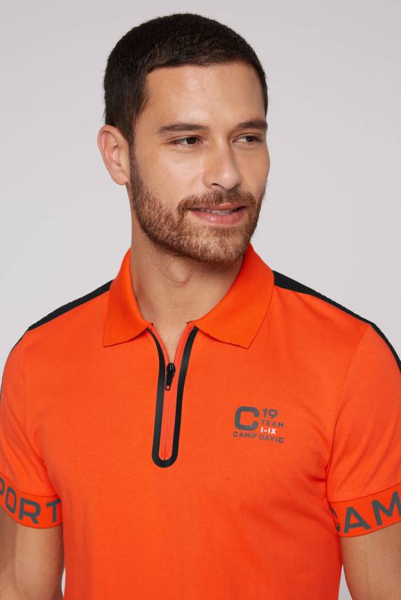 Soccx Poloshirt mit Zipper und kontrastvollen Prints signal orange Begrenzte Freigabe
