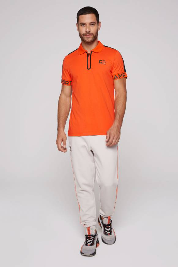 Soccx Poloshirt mit Zipper und kontrastvollen Prints signal orange Auslauf