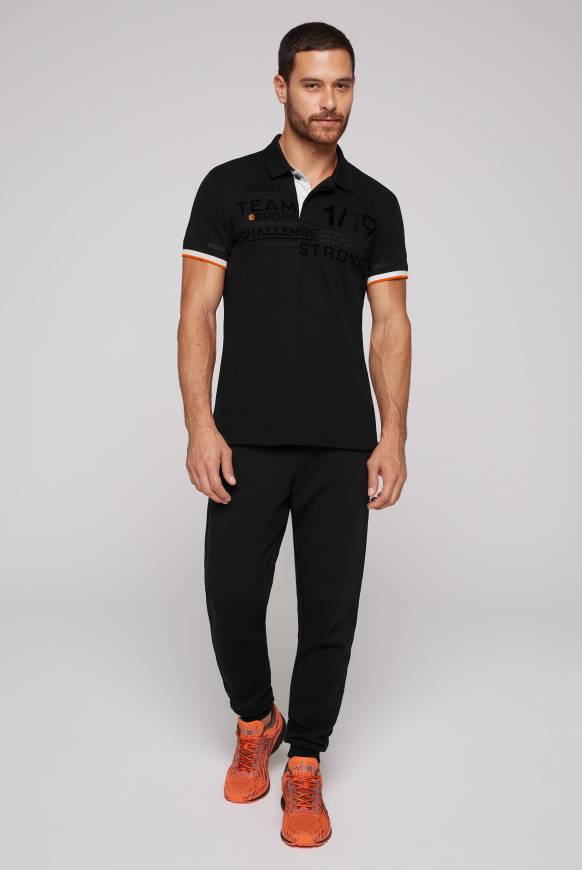 Soccx Pikee-Polo mit Flockprint black 50% Rabatt mit kostenlosem Versand
